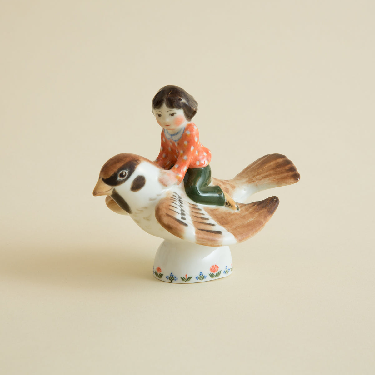 Child on a Sparrow Figurine