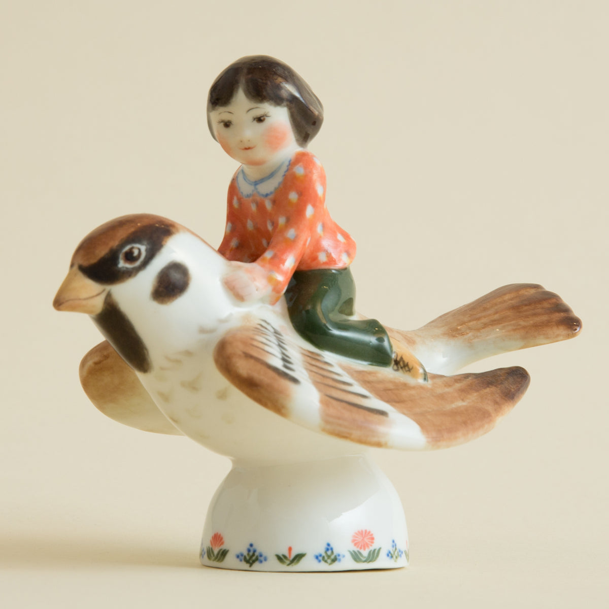 Child on a Sparrow Figurine