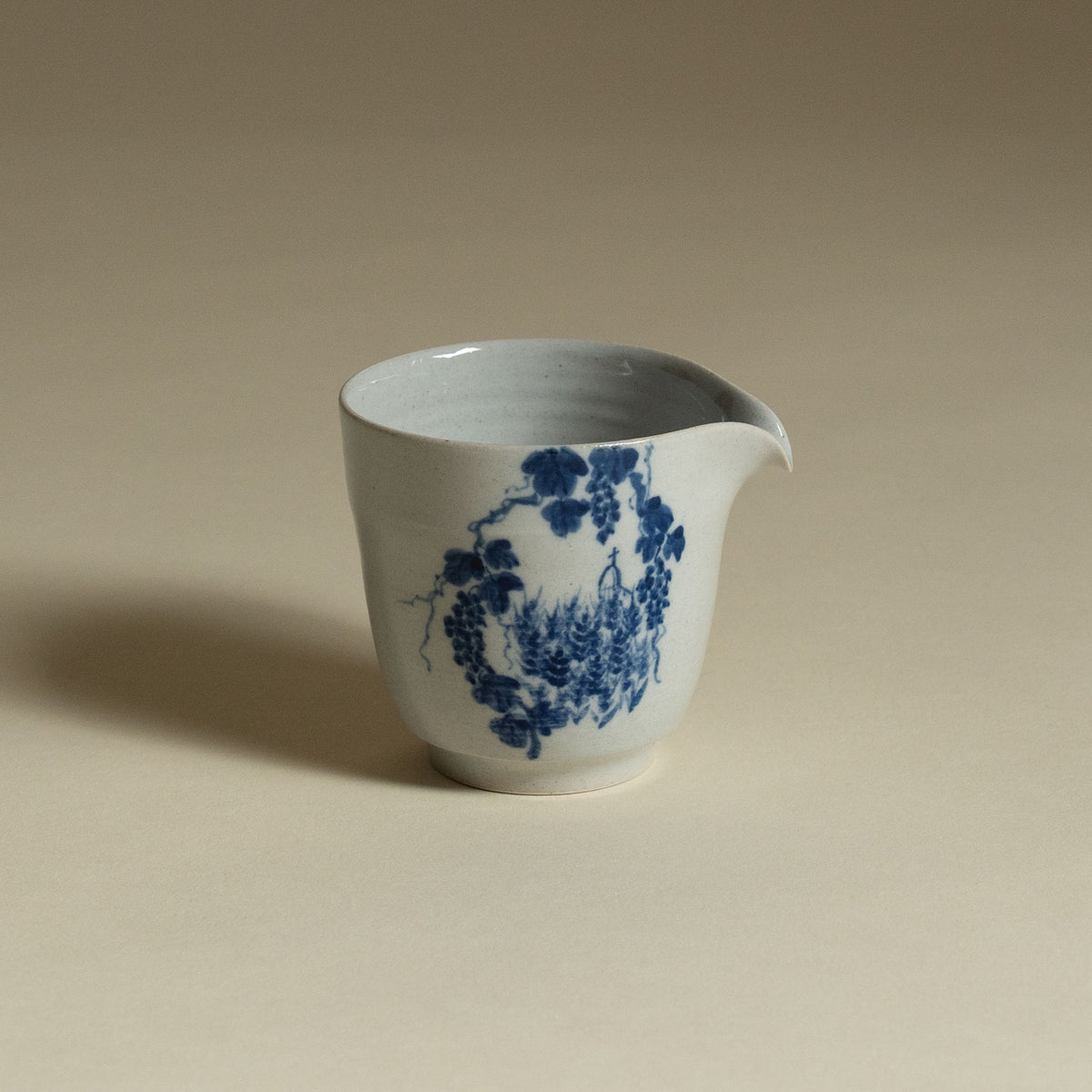 Handmade Korean porcelain tea pourer, hand-painted with blue grapevines