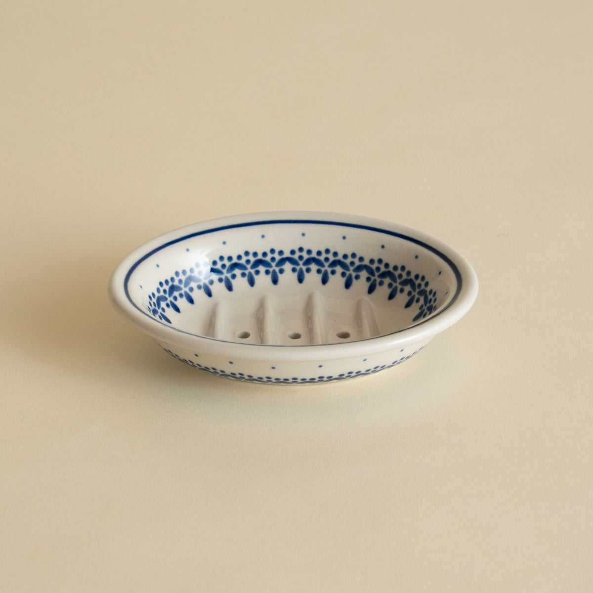 Blue and white vine-pattern Polish pottery soap dish from Bolesławiec with drainage holes