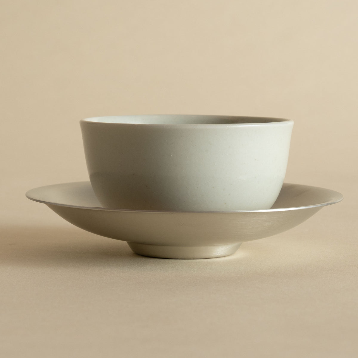 Porcelain Tea Cup and Pewter Plated Saucer