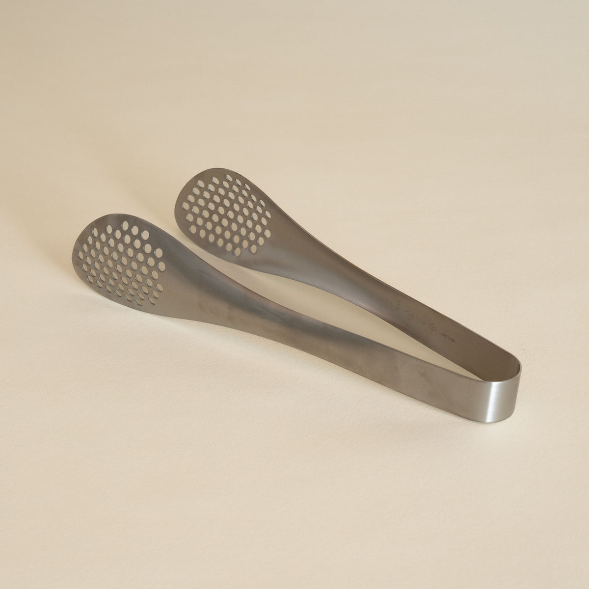 Sori Yanagi perforated stainless steel kitchen tongs