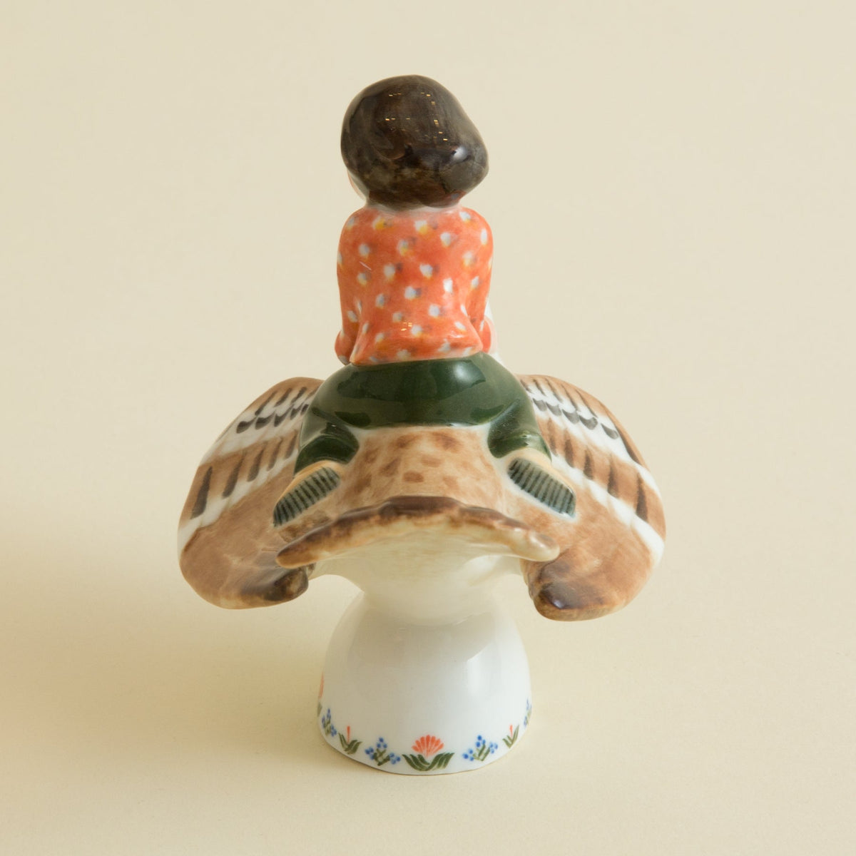 Child on a Sparrow FigurineFigurines