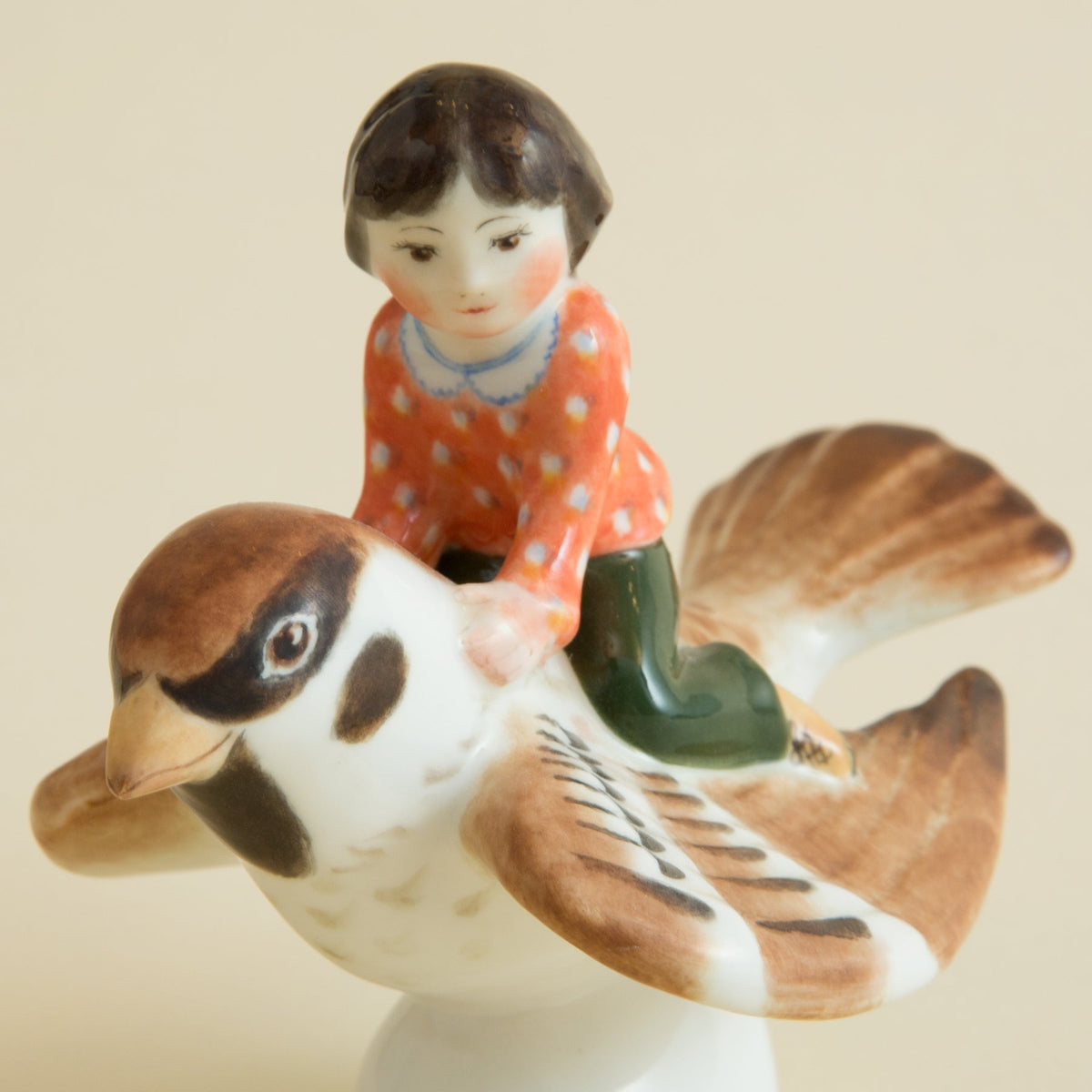 Child on a Sparrow FigurineFigurines