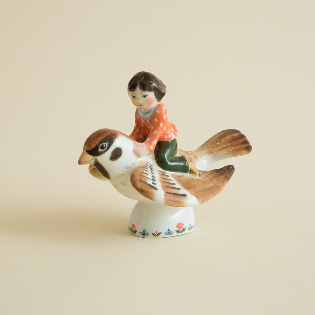 Child on a Sparrow FigurineFigurines