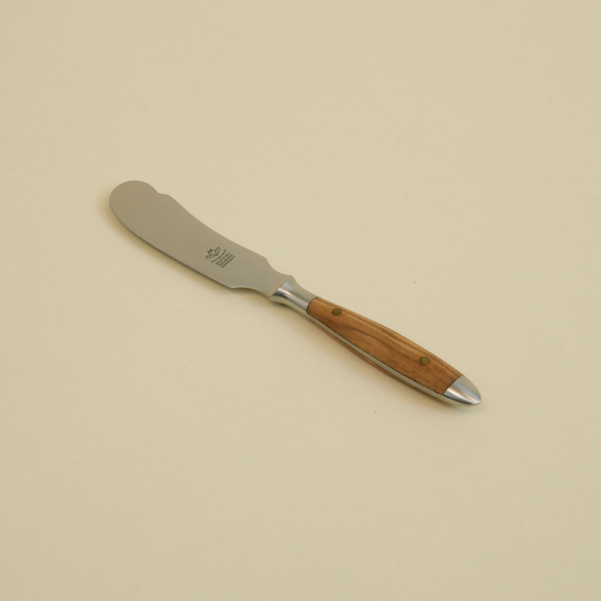 Eichenlaub hand-forged German butter knife with Olive handle and brass rivets