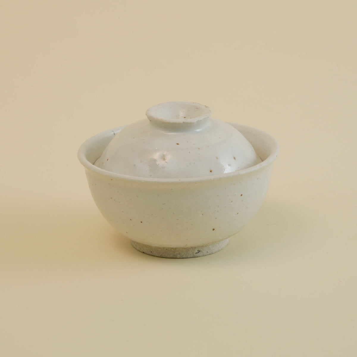 Handmade Iga-yaki lidded rice bowl in matte white Shino glaze