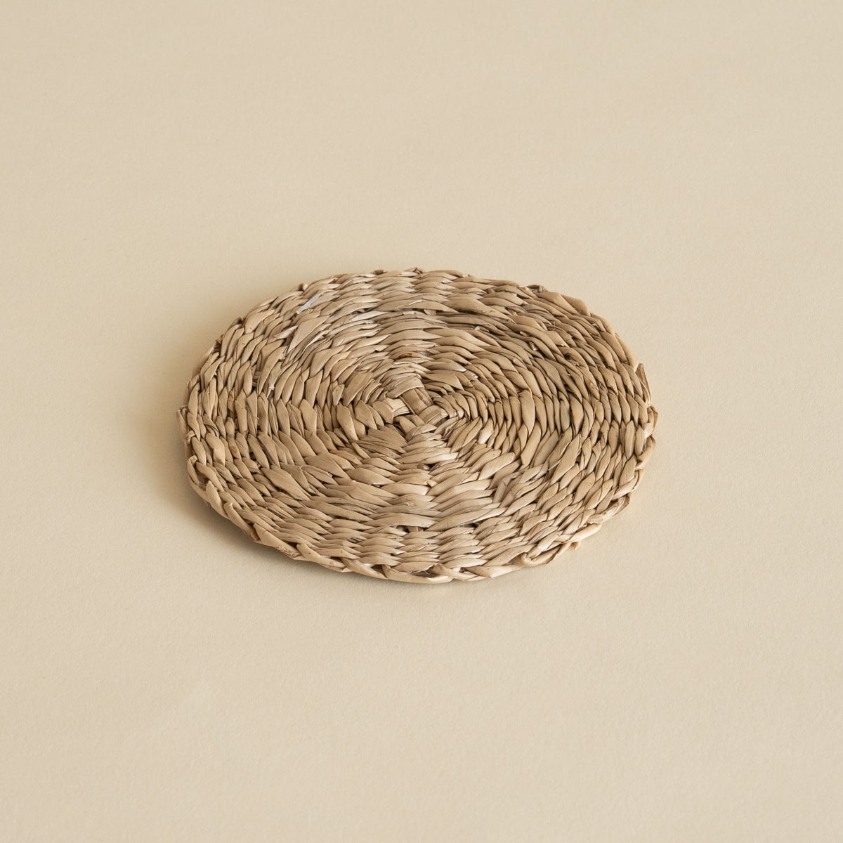 Japanese handmade woven straw coaster in natural straw