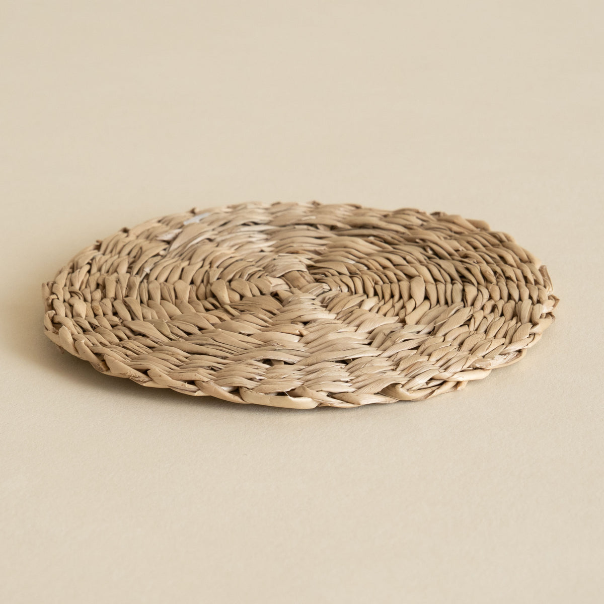 Japanese handmade woven straw coaster in natural straw