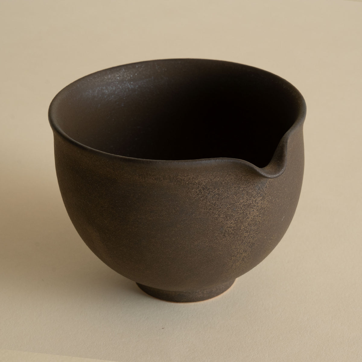 Handmade katakuchi matcha bowl with pouring spout in copper brown