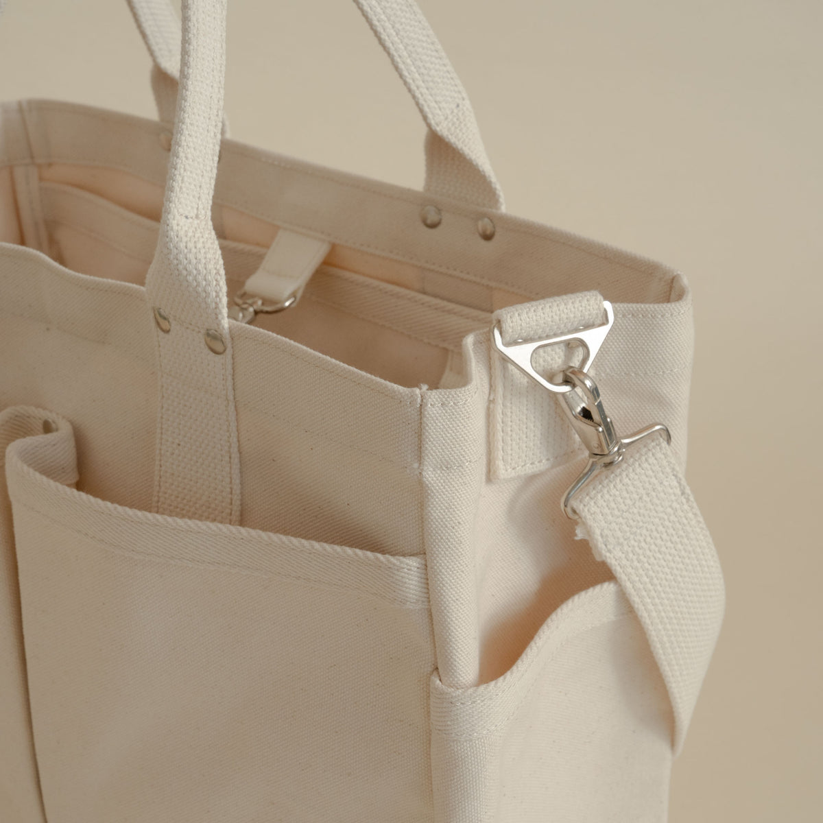Threadline cotton canvas tool tote with shoulder strap in white