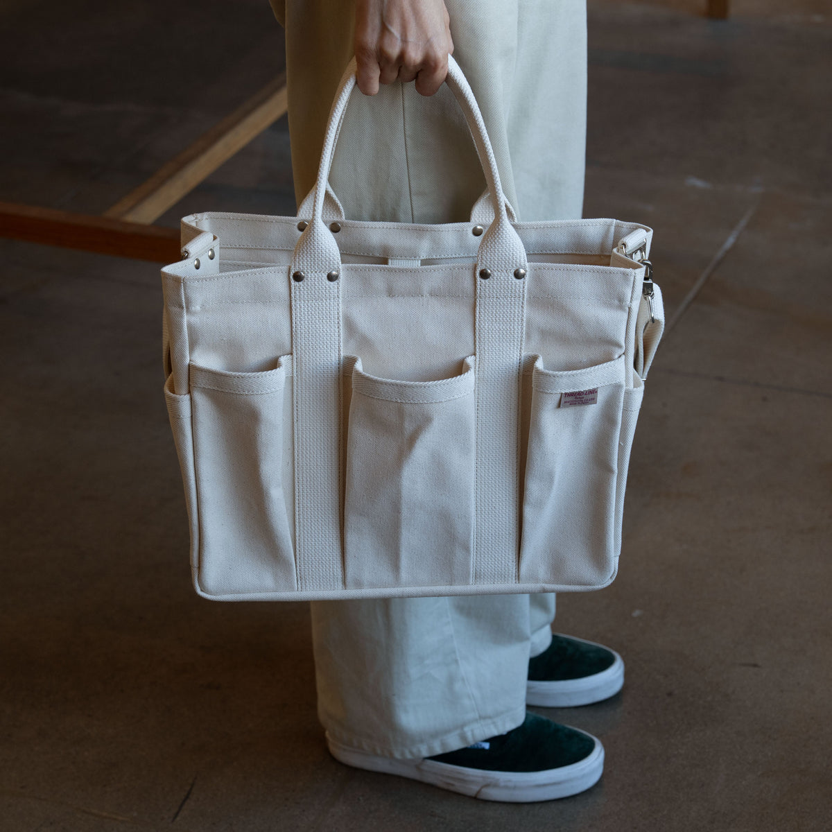 Threadline cotton canvas tool tote with shoulder strap in white